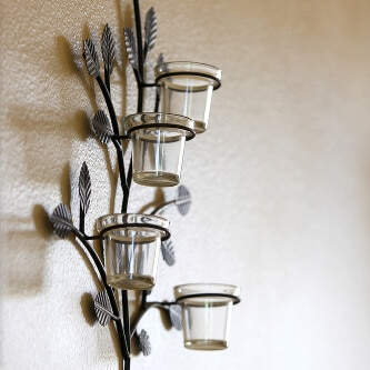 Wandkerzenhalter für mehrere Teelichter aus Metall und Glas