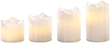 Britesta Flackerkerzen: 4 Echtwachskerzen mit beweglicher LED-Flamme, abgestuft, weiß (LED Kerzen) - 4